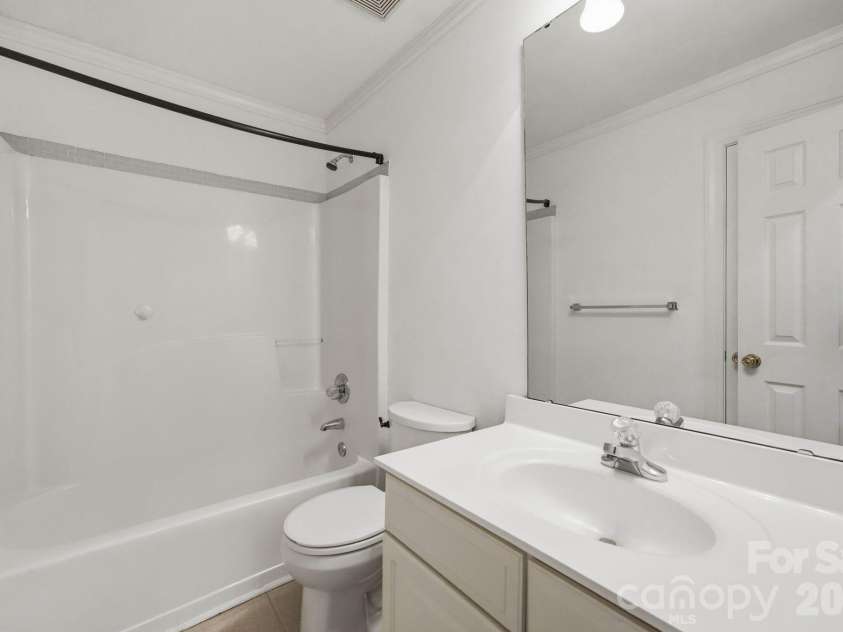 7119 Bevington Woods Lane, Charlotte, NC 28277.  MLS# CAR4416174, YatesRealty ID 47060. Guest Bathroom