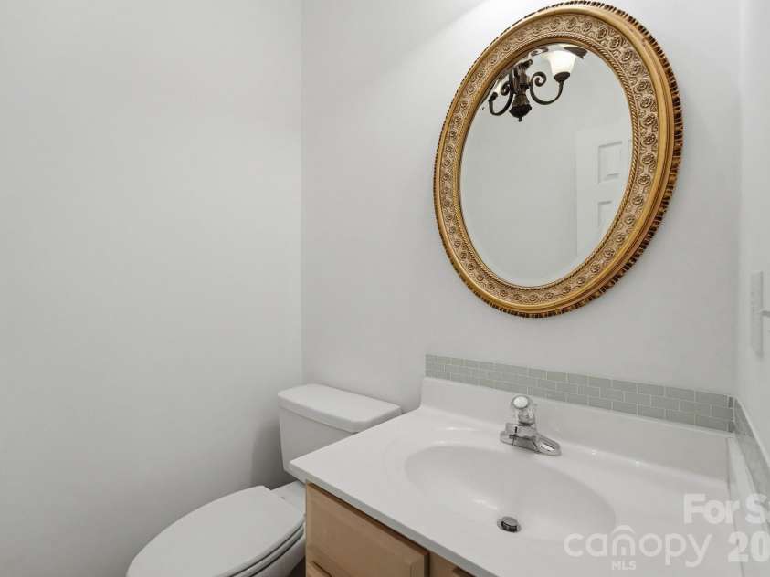 7119 Bevington Woods Lane, Charlotte, NC 28277.  MLS# CAR4416174, YatesRealty ID 47060. Half Bathroom Main Level