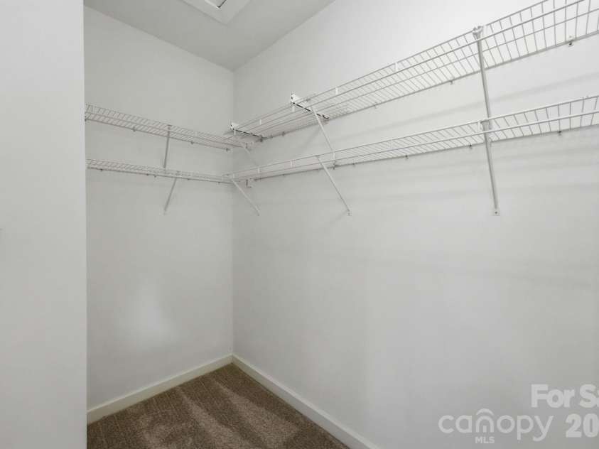 7119 Bevington Woods Lane, Charlotte, NC 28277.  MLS# CAR4416174, YatesRealty ID 47060. Primary Closet
