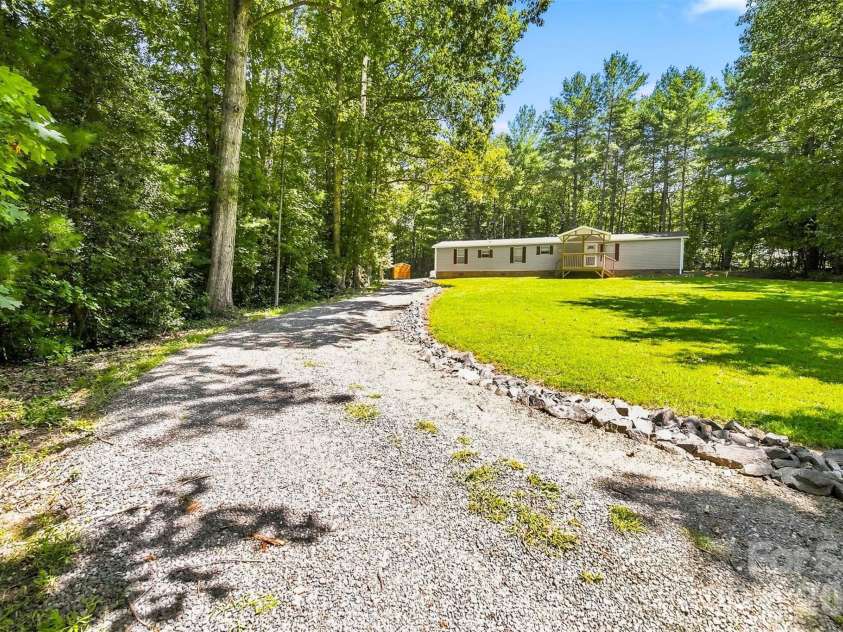 5668 Charlie Little Road, Granite Falls, NC 28630.  MLS# CAR4416192, YatesRealty ID 47064. Driving up this driveway feels good!