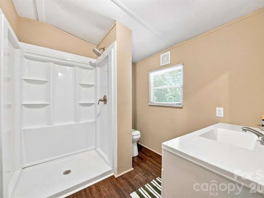 5668 Charlie Little Road, Granite Falls, NC 28630.  MLS# CAR4416192, YatesRealty ID 47064. Primary bath!