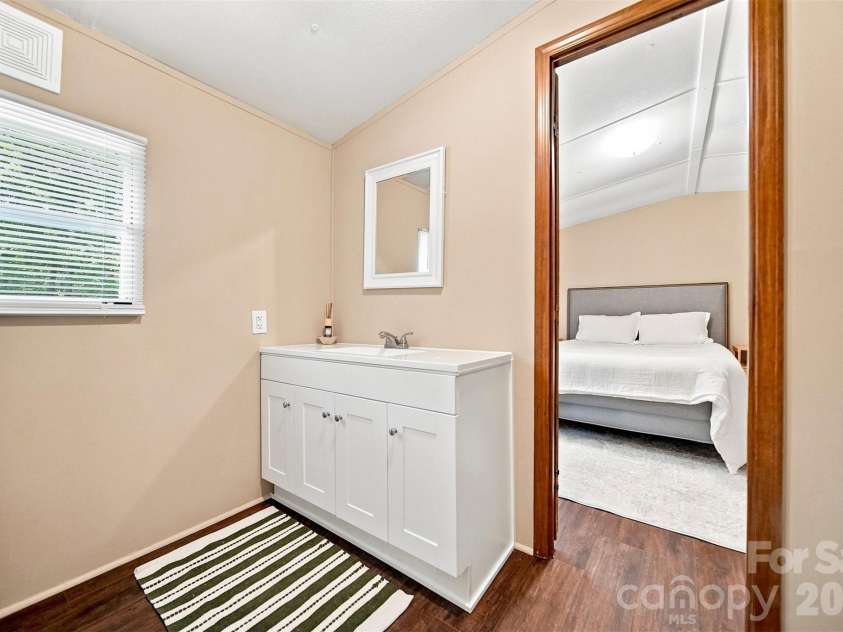 5668 Charlie Little Road, Granite Falls, NC 28630.  MLS# CAR4416192, YatesRealty ID 47064. Primary bath