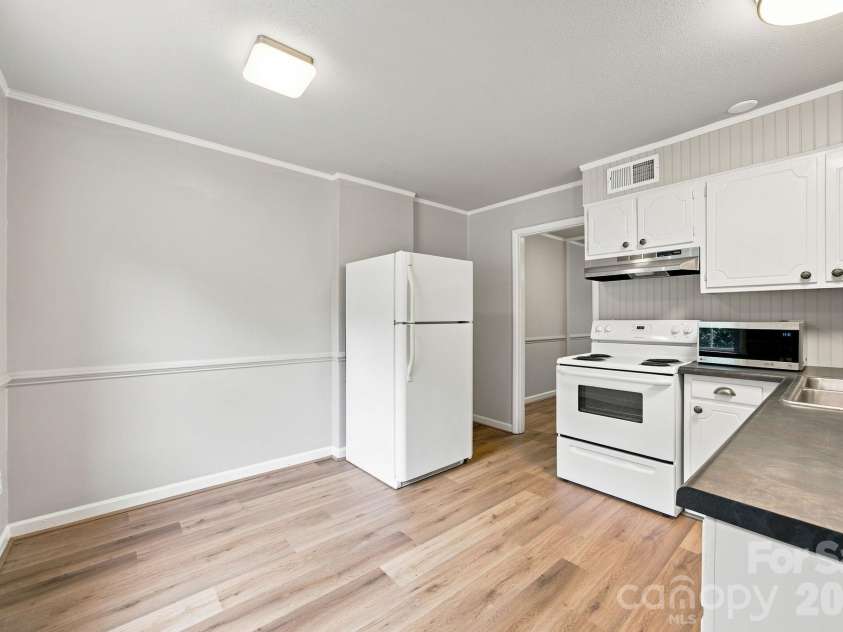 4603 Hedgemore Drive, Charlotte, NC 28209.  MLS# CAR4417329, YatesRealty ID 47068. New LVP Flooring