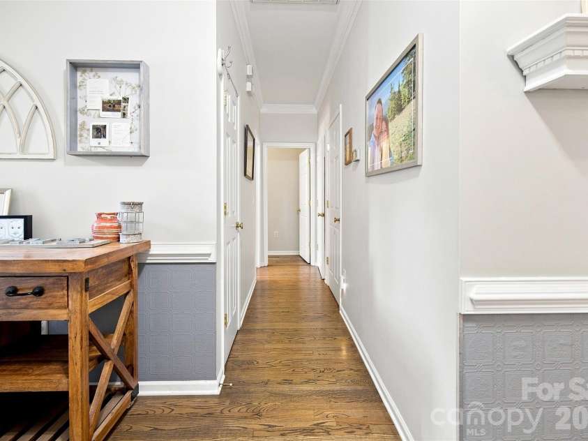 439 Glencrest Drive, Stanley, NC 28164.  MLS# CAR4415116, YatesRealty ID 47073. Front foyer to hallway leads to open floorplan for Dining Room/Kitchen/Living Room