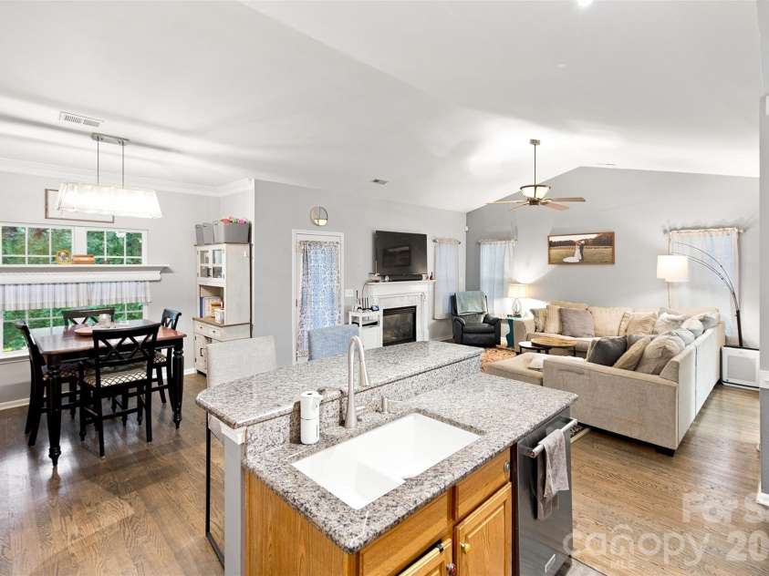 439 Glencrest Drive, Stanley, NC 28164.  MLS# CAR4415116, YatesRealty ID 47073. Kitchen/Dining/Living Rooms are open floorplan-great for entertaining.