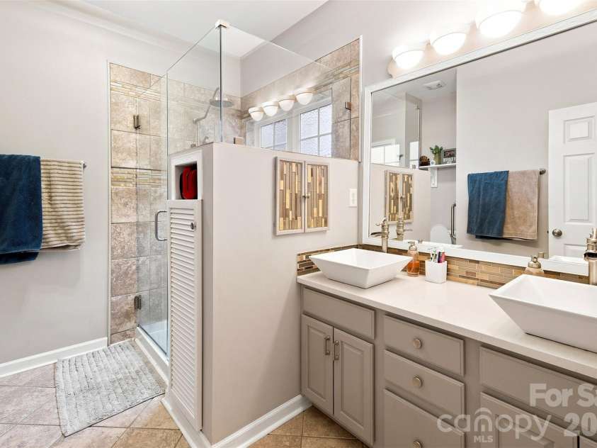 439 Glencrest Drive, Stanley, NC 28164.  MLS# CAR4415116, YatesRealty ID 47073. Primary Bathroom has heated tile floor.