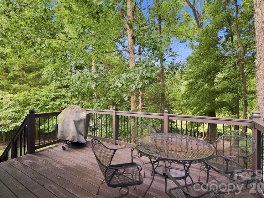 439 Glencrest Drive, Stanley, NC 28164.  MLS# CAR4415116, YatesRealty ID 47073. Such a peaceful tranquil setting in backyard, Enjoy relaxing on back deck.