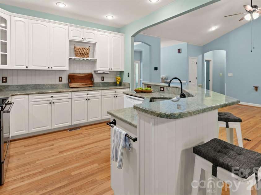 2017 Cameron Heights Circle, Denver, NC 28037.  MLS# CAR4410904, YatesRealty ID 47075. Ample seating at the kitchen island for those quick bites and conversation!