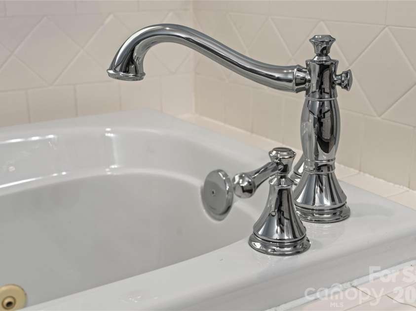 2017 Cameron Heights Circle, Denver, NC 28037.  MLS# CAR4410904, YatesRealty ID 47075. Classic and timeless polished chrome fixtures.