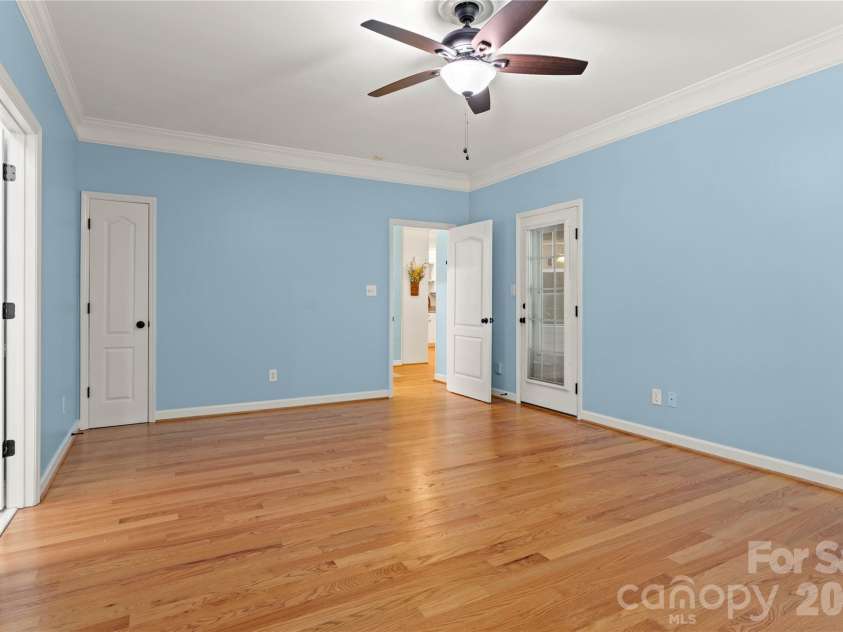2017 Cameron Heights Circle, Denver, NC 28037.  MLS# CAR4410904, YatesRealty ID 47075. Primary bedroom offers private access to the rear deck.  Linen closet provides even more storage!