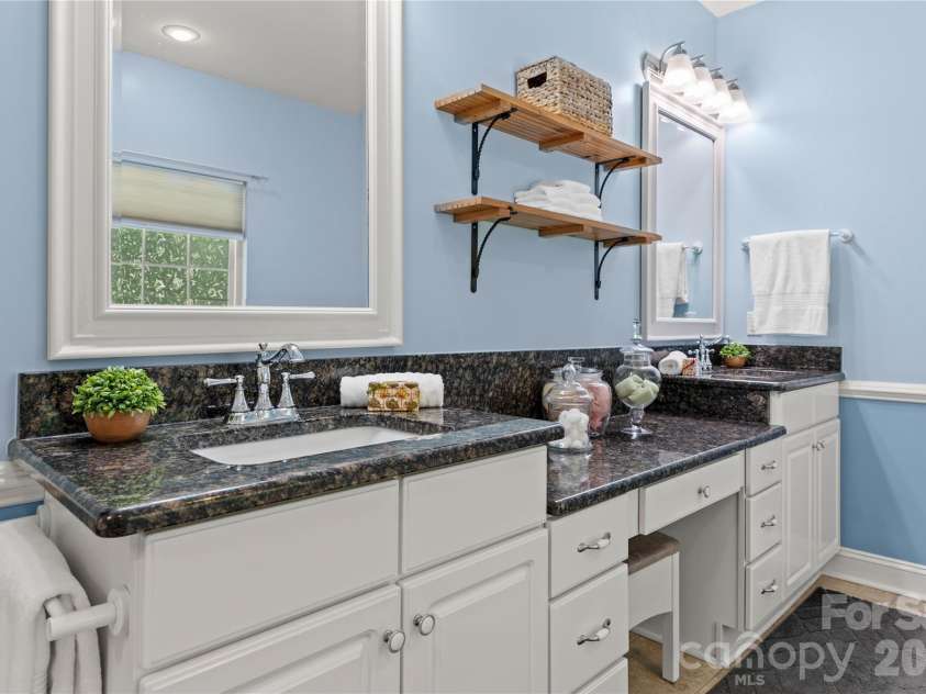 2017 Cameron Heights Circle, Denver, NC 28037.  MLS# CAR4410904, YatesRealty ID 47075. Spa-like primary suite with newer fixtures, countertops, tile floor and step down vanity.