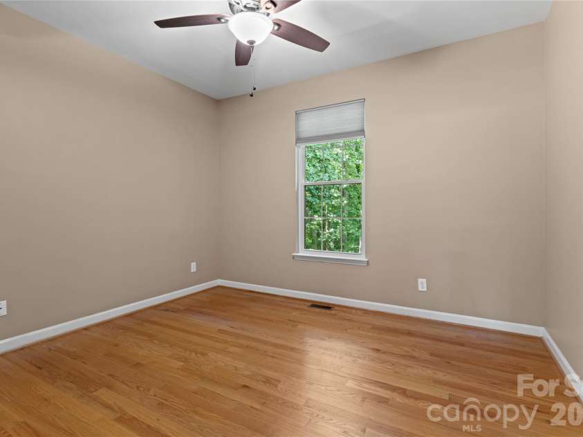 2017 Cameron Heights Circle, Denver, NC 28037.  MLS# CAR4410904, YatesRealty ID 47075. Spacious guest bedroom overlooking the rear yard.