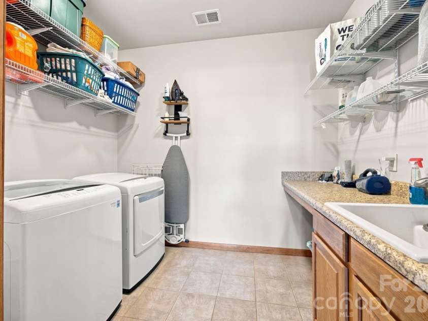 316 Riverwood Road, Mooresville, NC 28117.  MLS# CAR4414932, YatesRealty ID 47076. Laundry
