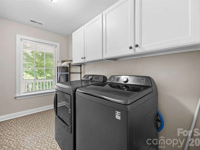 2209 Trading Ford Drive, Waxhaw, NC 28173.  MLS# CAR4413447, YatesRealty ID 47077. Upper level laundry room