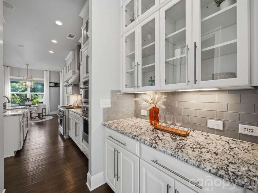 120 Eagles Landing Drive, Mooresville, NC 28117.  MLS# CAR4416069, YatesRealty ID 47082. Butler's pantry provides ample prep space