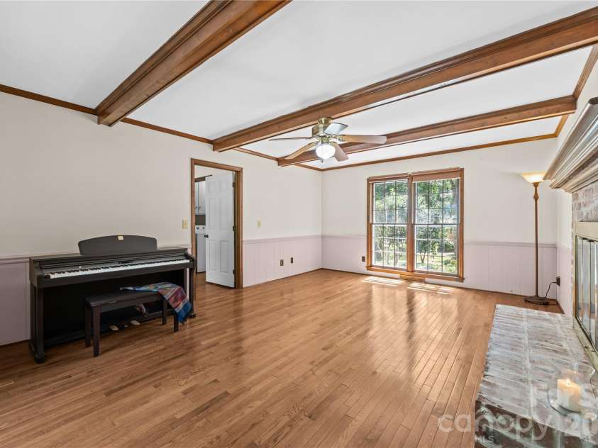 8800 Glencroft Road, Charlotte, NC 28227.  MLS# CAR4416112, YatesRealty ID 47087. Den, great for relaxing or entertaining