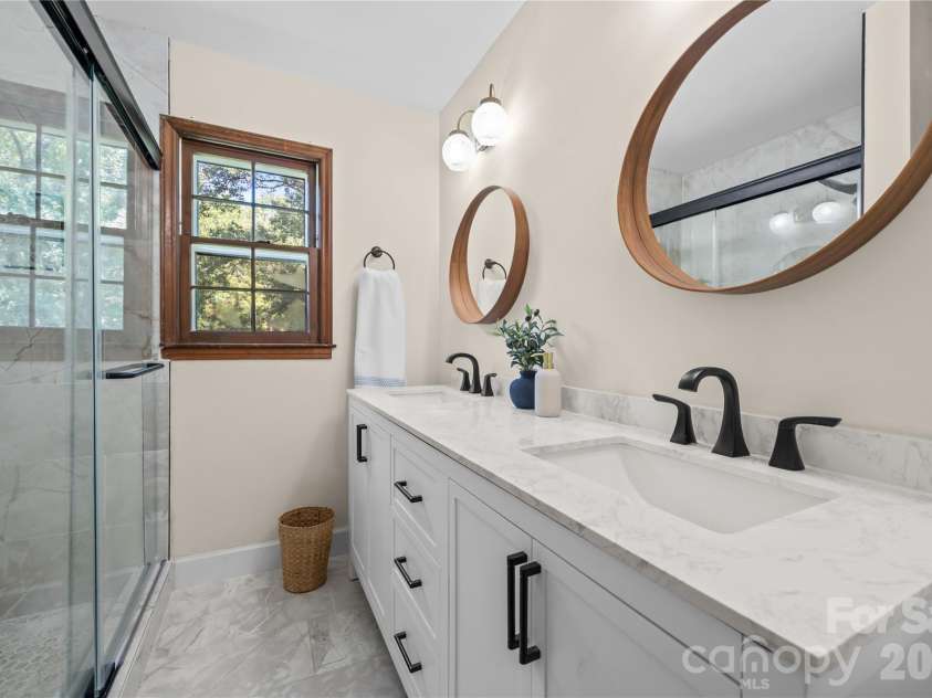 8800 Glencroft Road, Charlotte, NC 28227.  MLS# CAR4416112, YatesRealty ID 47087. Primary bathroom with modern upgrades