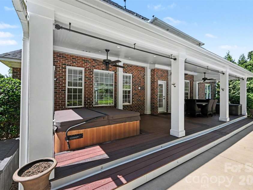 2858 Scarborough Court, Gastonia, NC 28054.  MLS# CAR4384743, YatesRealty ID 47089. Covered Deck with Hot Tub