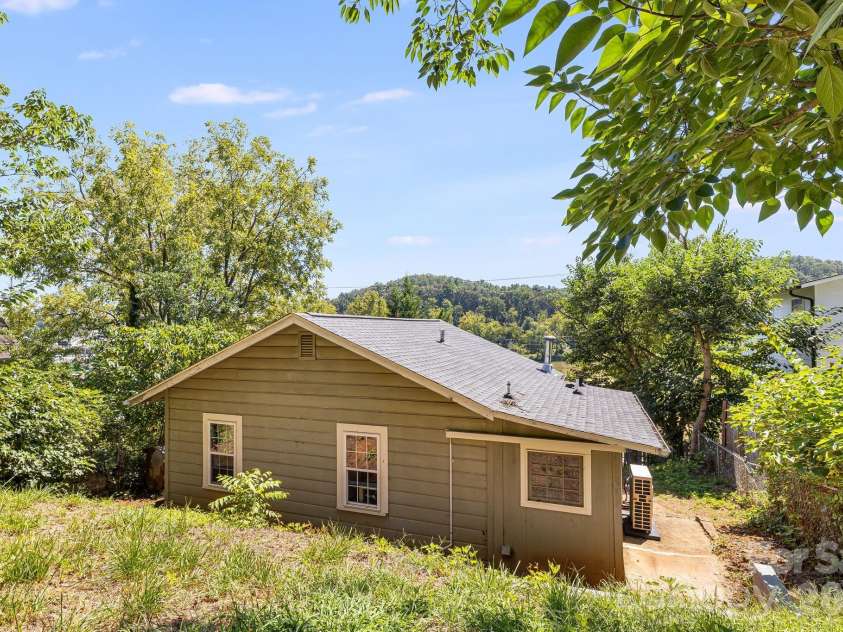 1055 Riverside Drive, Asheville, NC 28804.  MLS# CAR4397717, YatesRealty ID 47092. Backyard