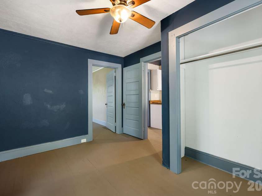 1055 Riverside Drive, Asheville, NC 28804.  MLS# CAR4397717, YatesRealty ID 47092. Bedroom 2- Blue- off kitchen