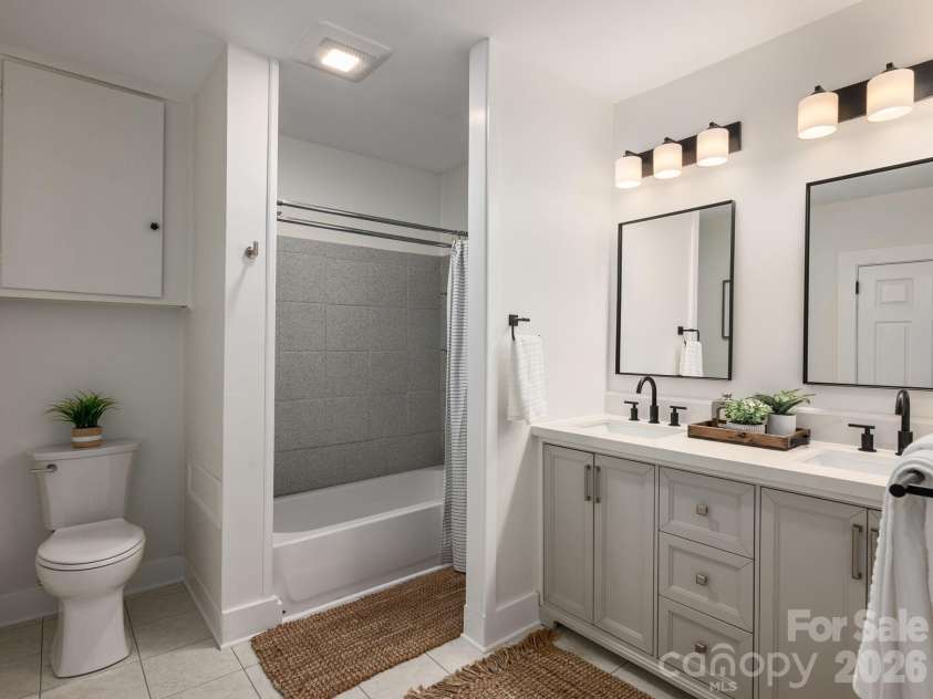 304 Old Haw Creek Road, Asheville, NC 28805.  MLS# CAR4406556, YatesRealty ID 47093. Updated Primary Bath with Double Vanity