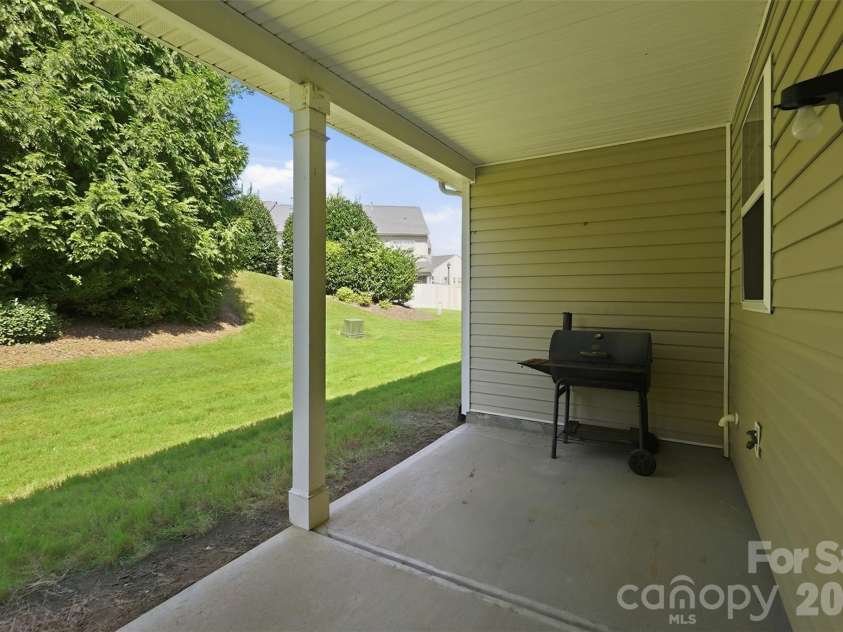 217 River Clay Road, Fort Mill, SC 29708.  MLS# CAR4415592, YatesRealty ID 47096. Back patio