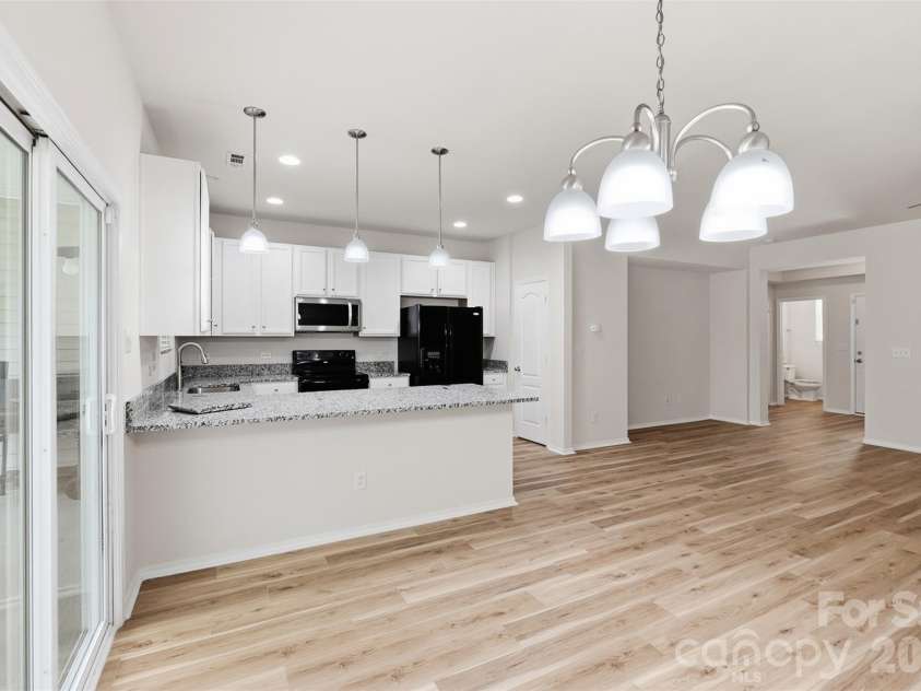 217 River Clay Road, Fort Mill, SC 29708.  MLS# CAR4415592, YatesRealty ID 47096. Great room and kitchen