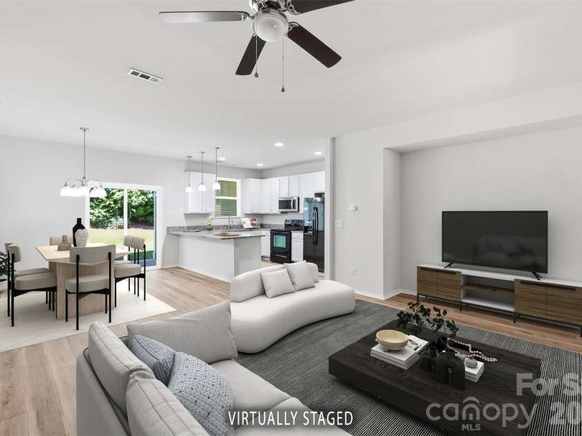217 River Clay Road, Fort Mill, SC 29708.  MLS# CAR4415592, YatesRealty ID 47096. Great room, dining and kitchen