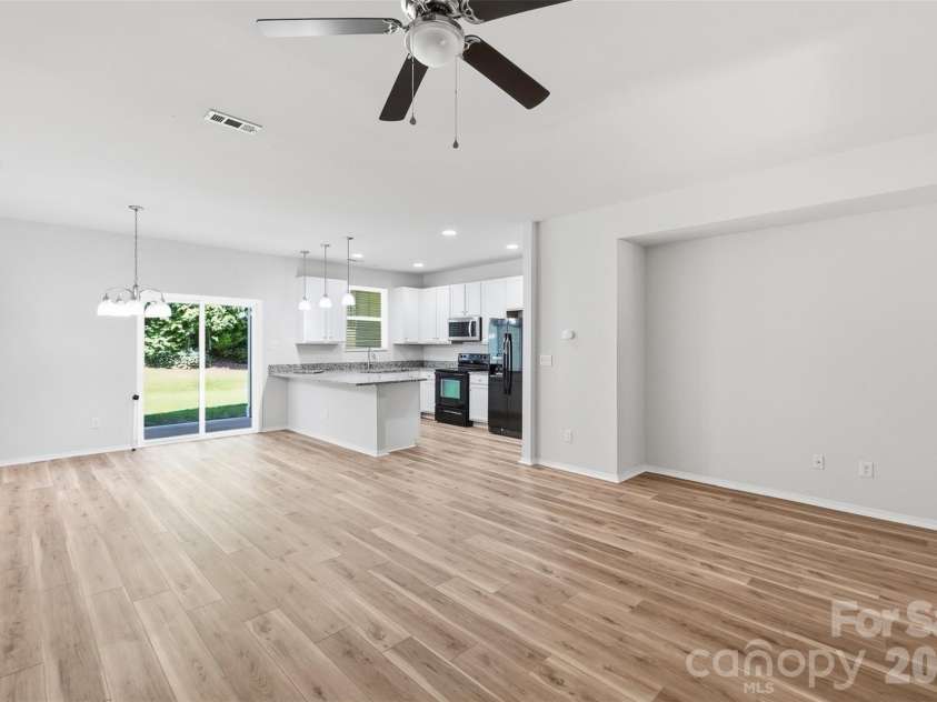 217 River Clay Road, Fort Mill, SC 29708.  MLS# CAR4415592, YatesRealty ID 47096. Great room, dining and kitchen