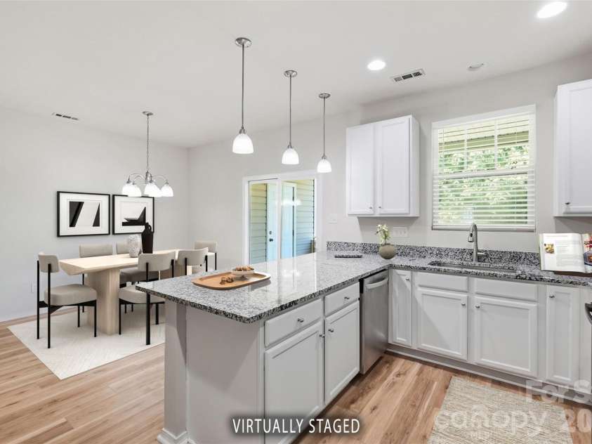 217 River Clay Road, Fort Mill, SC 29708.  MLS# CAR4415592, YatesRealty ID 47096. Kitchen counter and dining area