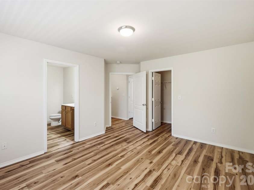 217 River Clay Road, Fort Mill, SC 29708.  MLS# CAR4415592, YatesRealty ID 47096. Primary suite (en-suite bath & walk-in closet)