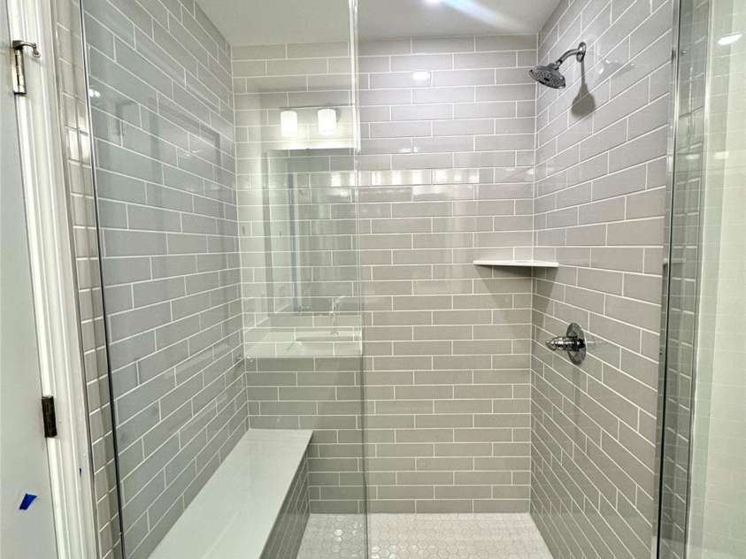 7709 Ethora Way, Charlotte, NC 28216.  MLS# CAR4326124, YatesRealty ID 4710. Owner's Bathroom- Tiled Shower