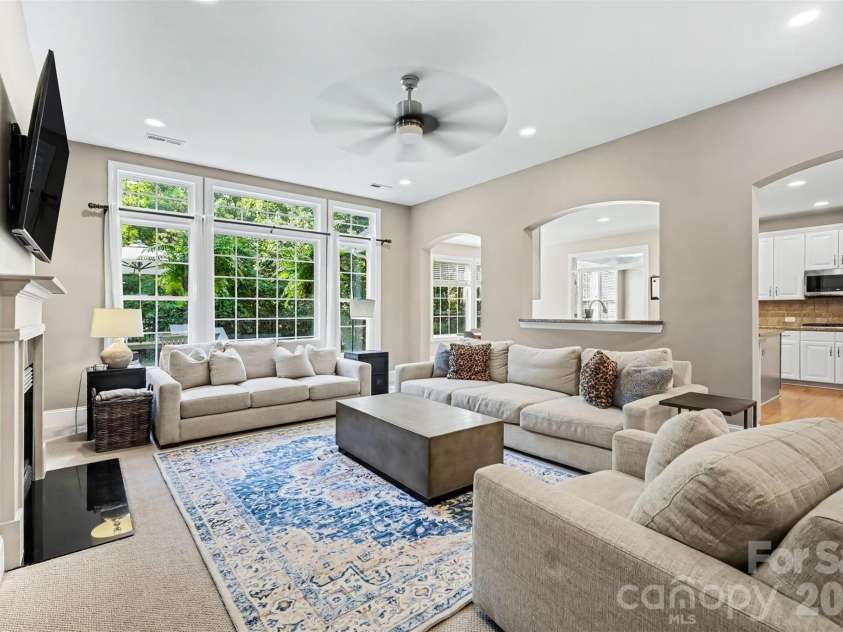 11242 Wheat Ridge Road, Charlotte, NC 28277.  MLS# CAR4416116, YatesRealty ID 47105. Living Room leading into Kitchen