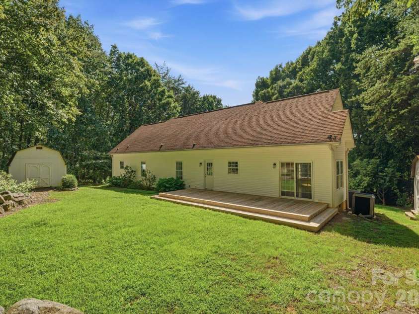 5480 Liberty Hill Road, York, SC 29745.  MLS# CAR4416036, YatesRealty ID 47114. Rear view of home with expansive cedar deck