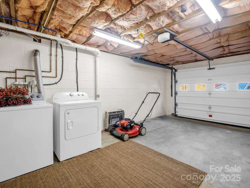 19 Robert E Lee Drive, Flat Rock, NC 28731.  MLS# CAR4235643, YatesRealty ID 4712. One bay of garage on lower level