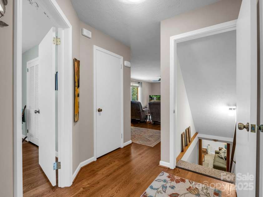 19 Robert E Lee Drive, Flat Rock, NC 28731.  MLS# CAR4235643, YatesRealty ID 4712. Stairs to lower level