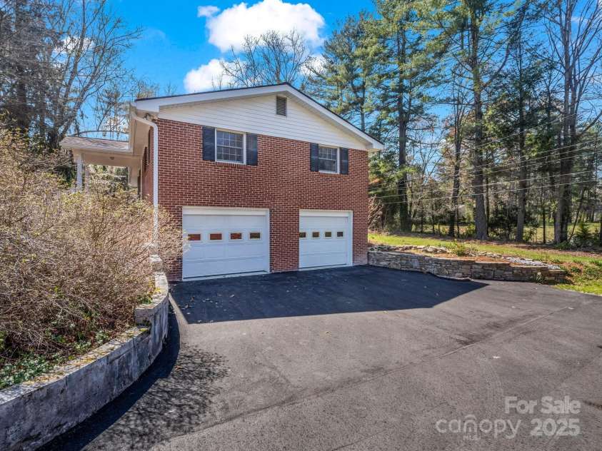 19 Robert E Lee Drive, Flat Rock, NC 28731.  MLS# CAR4235643, YatesRealty ID 4712. Two car Garage