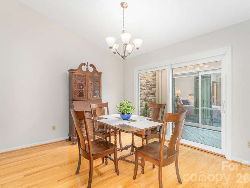 121 Deerlake Drive, Asheville, NC 28803.  MLS# CAR4417222, YatesRealty ID 47122. Dining area overlooking atrium