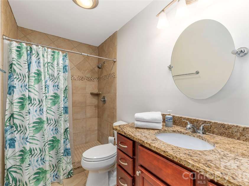 121 Deerlake Drive, Asheville, NC 28803.  MLS# CAR4417222, YatesRealty ID 47122. Secondary bathroom updated