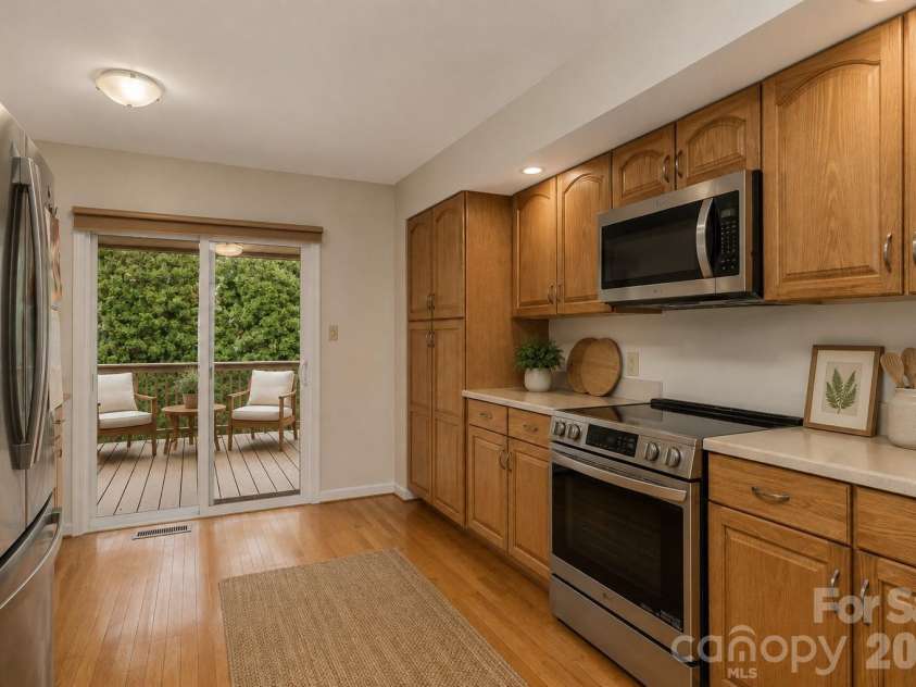 121 Deerlake Drive, Asheville, NC 28803.  MLS# CAR4417222, YatesRealty ID 47122. Virtually staged