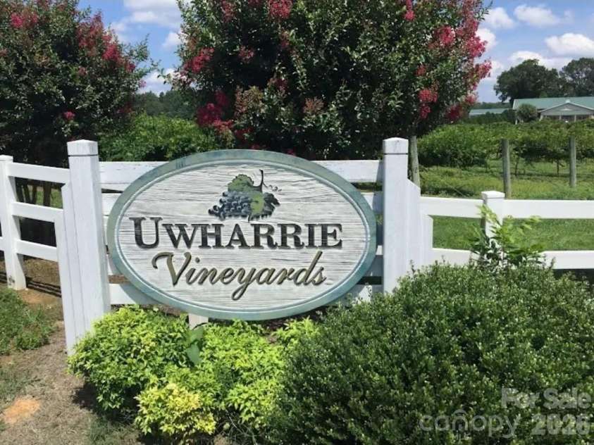 911 Hill Street, Albemarle, NC 28001.  MLS# CAR4407669, YatesRealty ID 47127. Nearby local vineyard