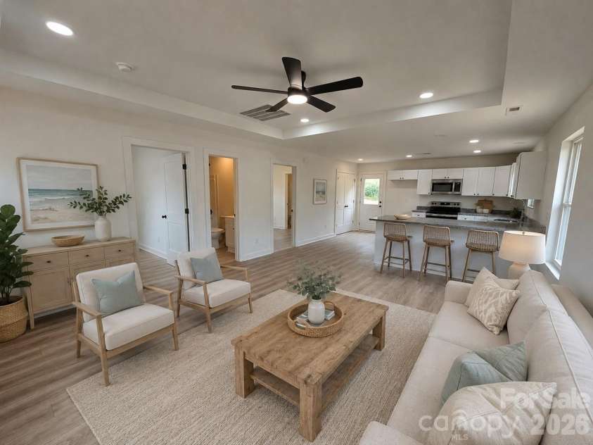 911 Hill Street, Albemarle, NC 28001.  MLS# CAR4407669, YatesRealty ID 47127. Open concept living for maximized space (virtual stage)