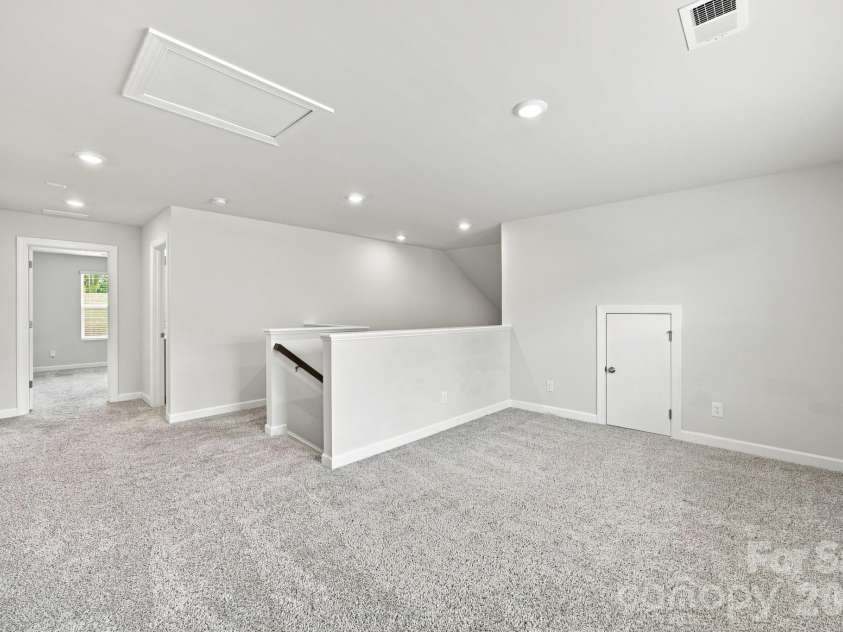 4405 Duplin Drive, Charlotte, NC 28214.  MLS# CAR4418715, YatesRealty ID 47128. Loft for office space or rec area