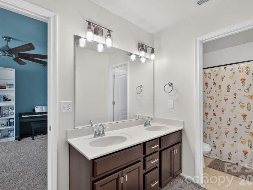 1845 Caprington Drive, Indian Land, SC 29707.  MLS# CAR4414177, YatesRealty ID 47146. Bathroom adjoining 5th bedroom/flex space