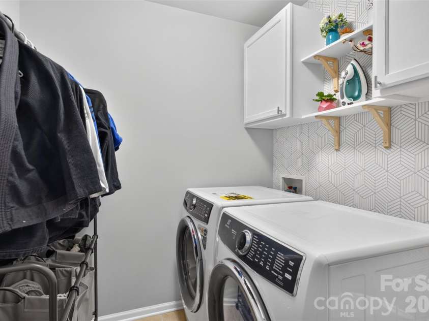 1845 Caprington Drive, Indian Land, SC 29707.  MLS# CAR4414177, YatesRealty ID 47146. Large laundry room on the second floor