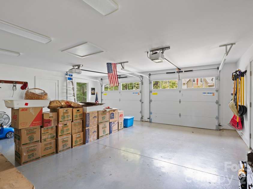 497 Kimberly Avenue, Asheville, NC 28804.  MLS# CAR4418041, YatesRealty ID 47149. Large two car garage