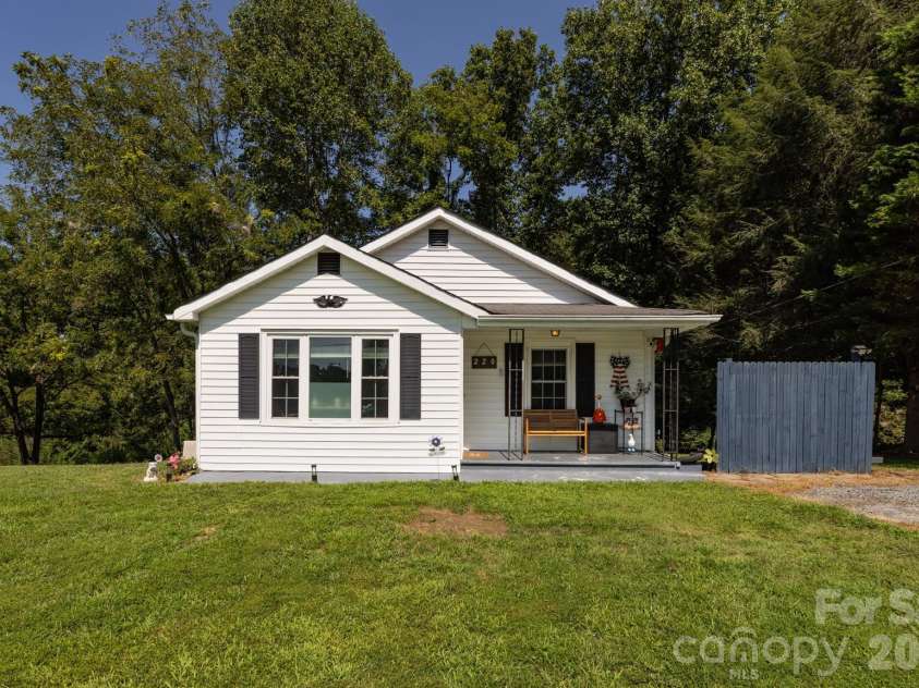 220 Collins Road, Elkin, NC 28621.  MLS# CAR4418851, YatesRealty ID 47151. 