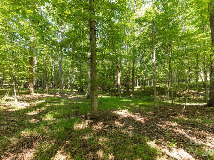 220 Collins Road, Elkin, NC 28621.  MLS# CAR4418851, YatesRealty ID 47151. 