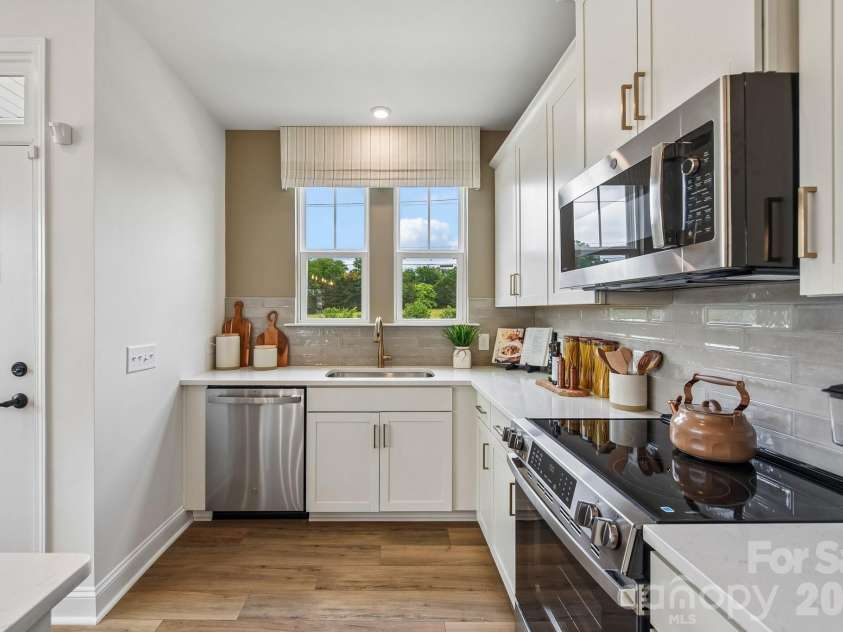 9028 Gulledge Court, Charlotte, NC 28262.  MLS# CAR4418885, YatesRealty ID 47159. Representative Photo From Model