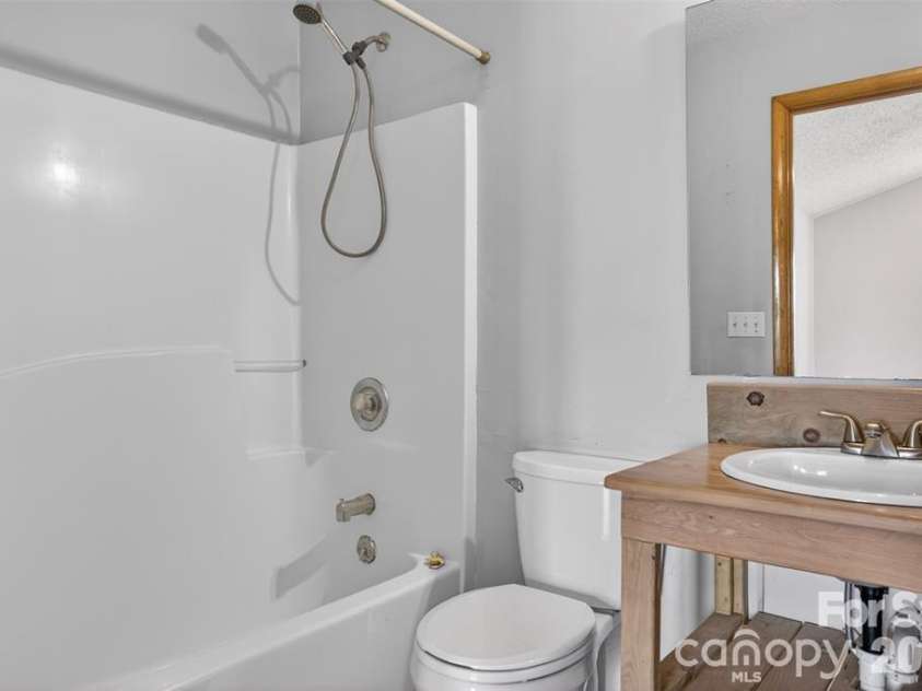 00 Misery Ridge Trail, Mill Spring, NC 28756.  MLS# CAR4385906, YatesRealty ID 47162. En-suite bathroom.